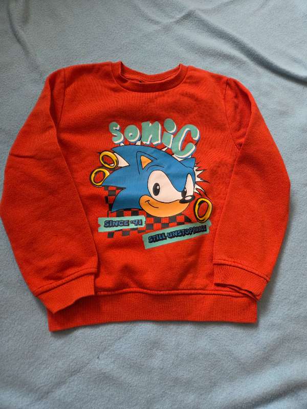Sonic peysa appelsinugulur 122