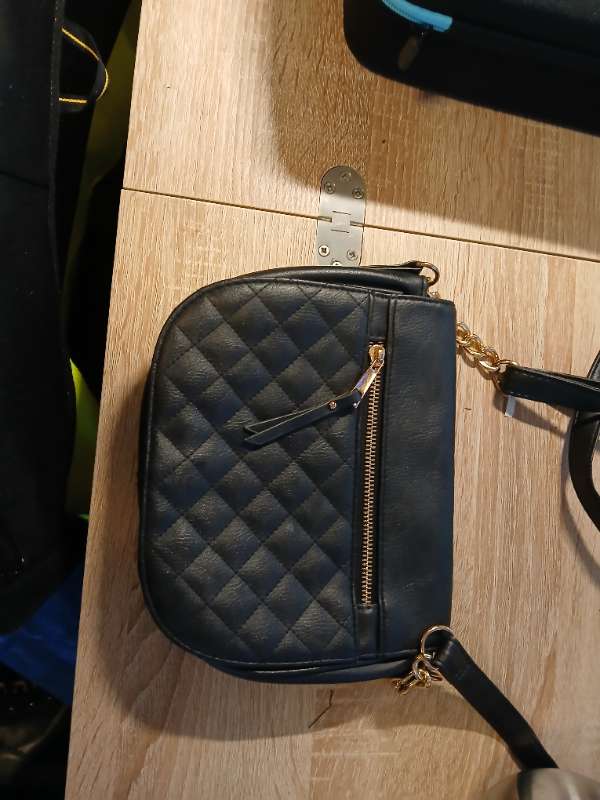 Svart kvennmanns veski