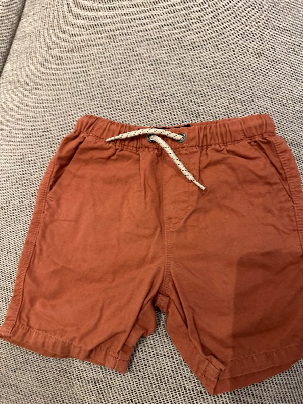 Next stuttbuxur brúnar