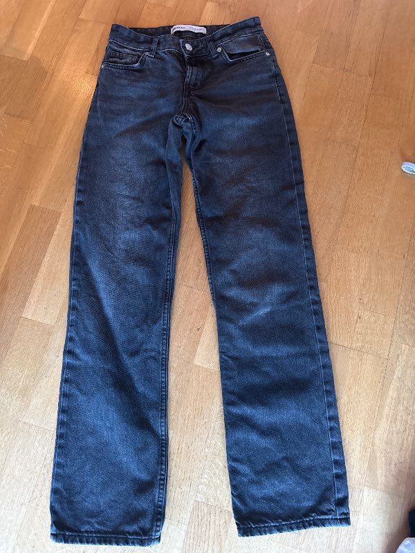 Svartar gallabuxur BERSHKA