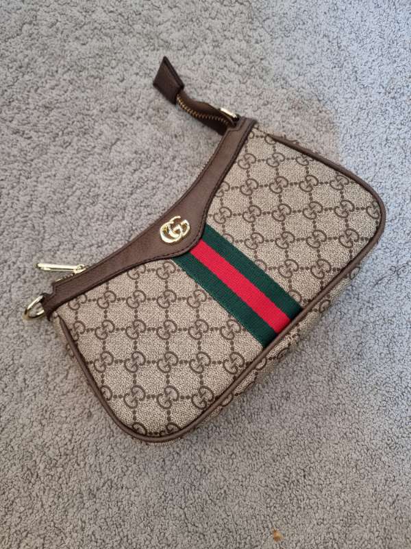 Gucci taska ekki ekta