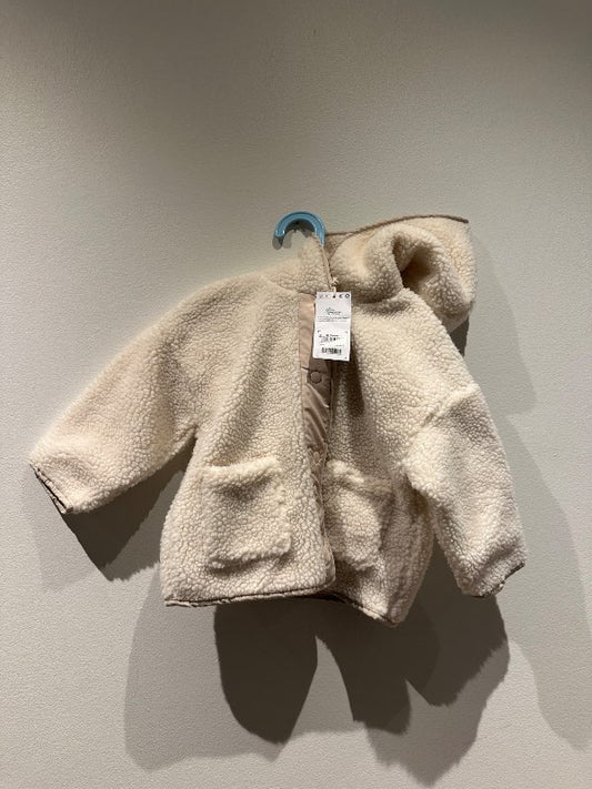 Next krullujakki nýr