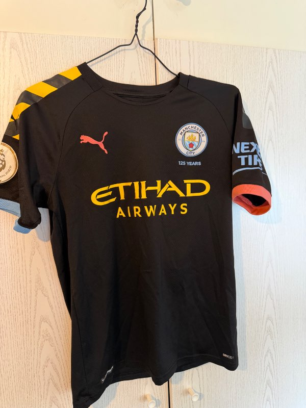Man City treyja