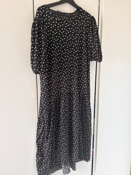black polka-dot dress