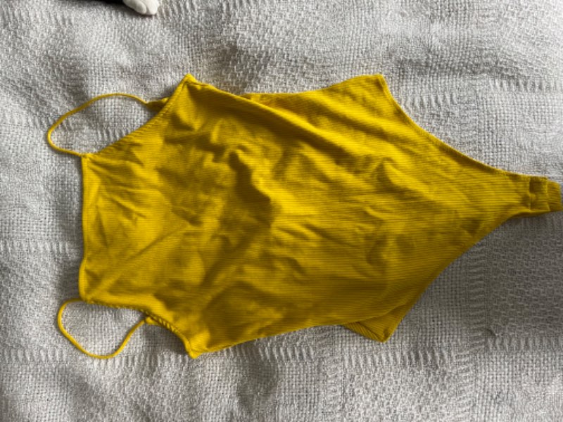 Yellow bodysuit