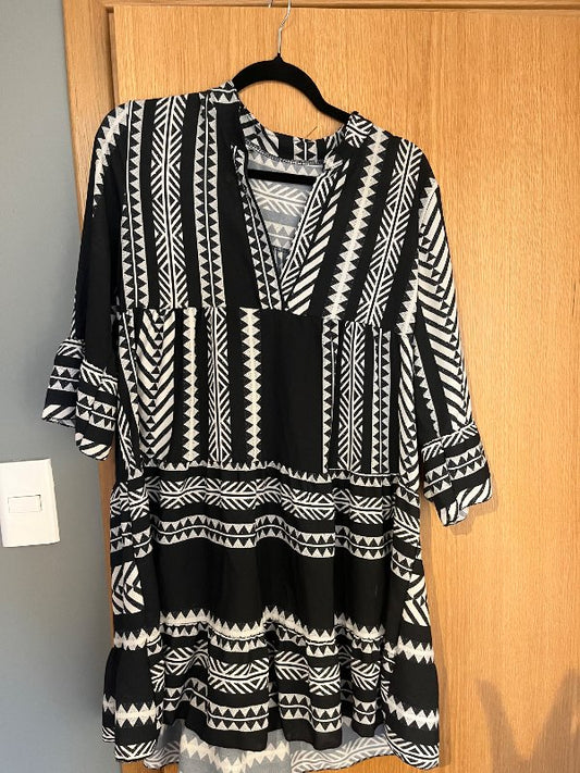 G.Köflóttur kjóll