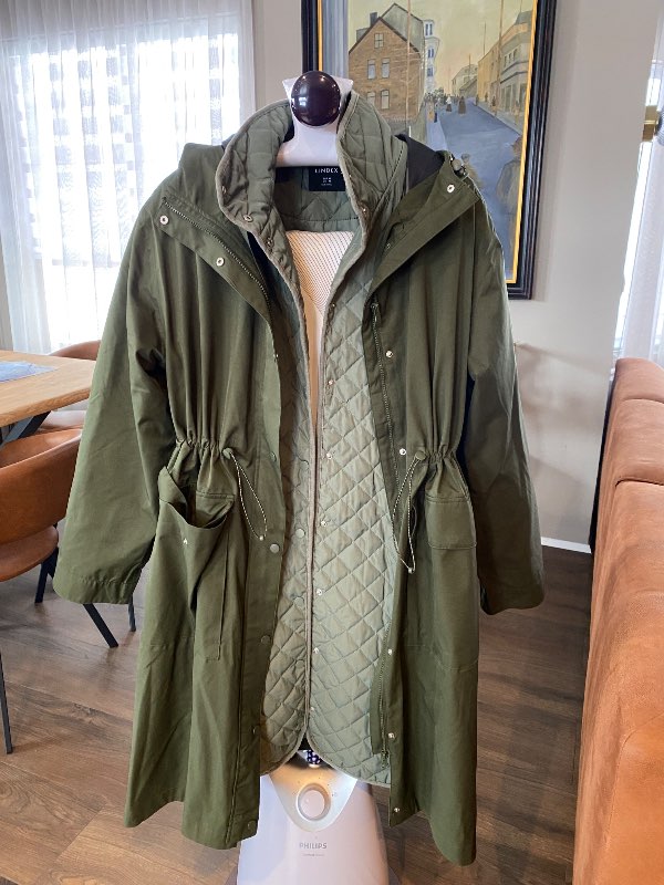 Green jacket raincoat