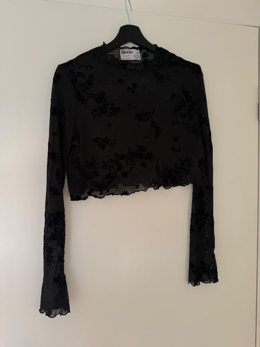 Rita Ora blúndu crop top