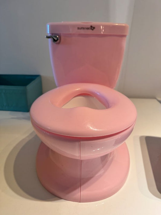 Pink potty training toilet
