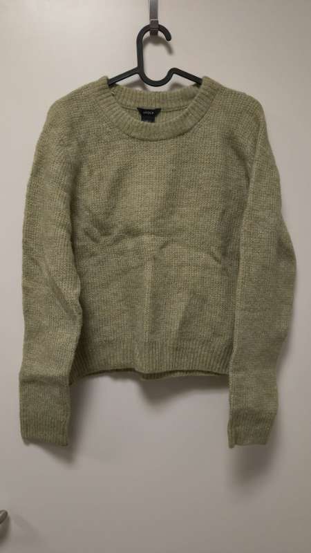 green sweater