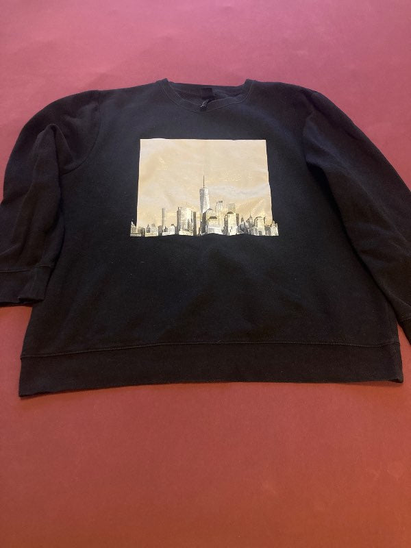 Svart peysa með ljósmynd úr H&M