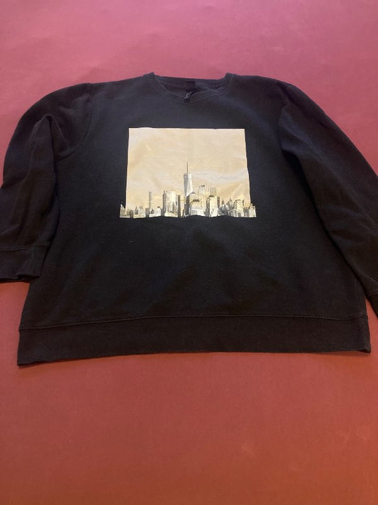 Svart peysa með ljósmynd úr H&M