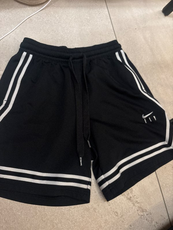 Svartar Nike stullur með röndum