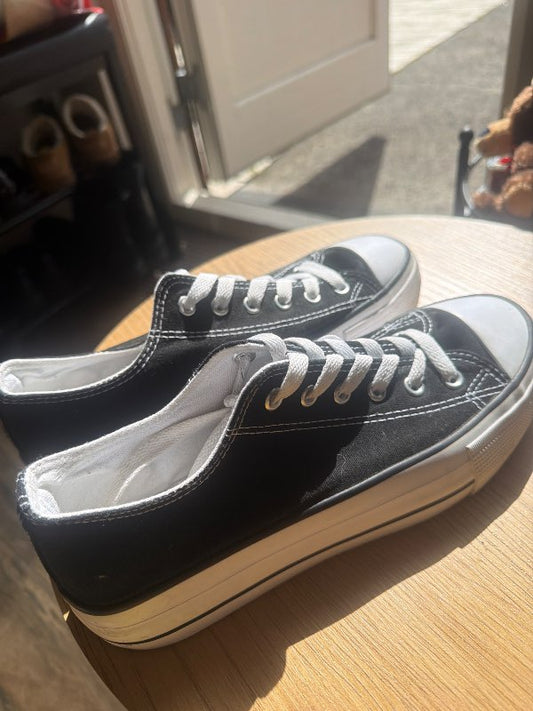 black sneakers
