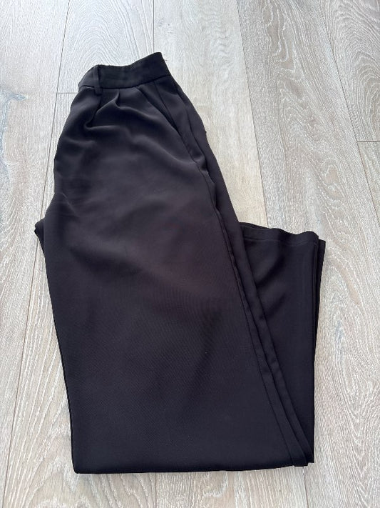 Svartar spari buxur